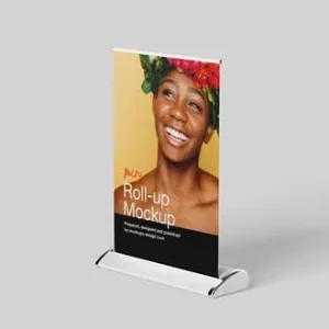 A roll-up banner with high-quality graphics displayed at a printing service in Sharjah.